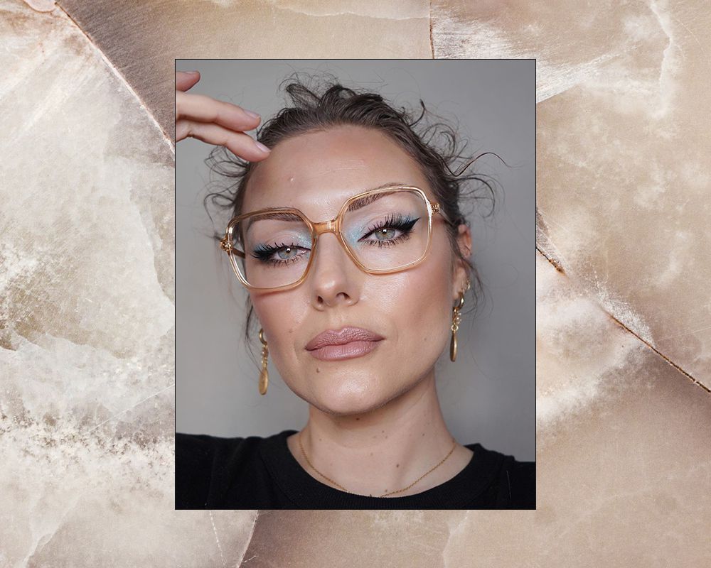 Katie Jane Hughes with a pop of blue eyeshadow