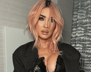 Megan Fox wearing a pink shag hairstyle.