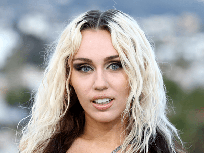 Miley Cyrus at the Versace fashion show. 