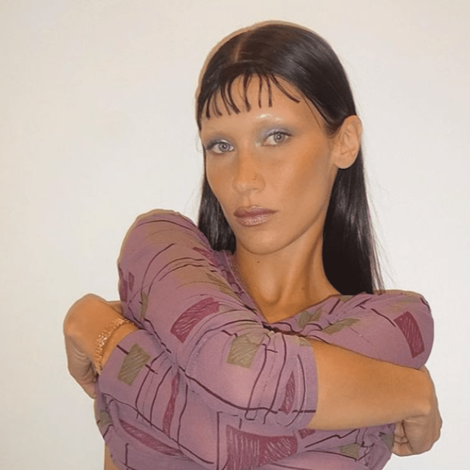 Bella Hadid with thin micro bangs